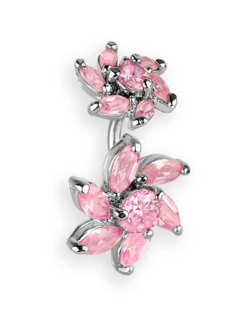 Navel piercing with two pink rhinestone flowers